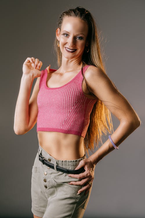Smiling Woman in Pink Top