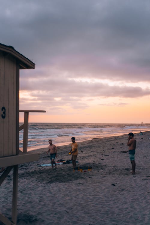 People on Beach at Sunset