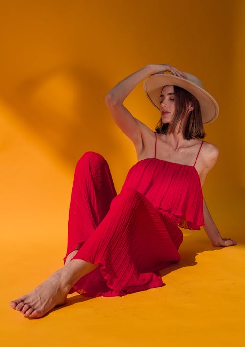 Woman in Hat and Red Dress