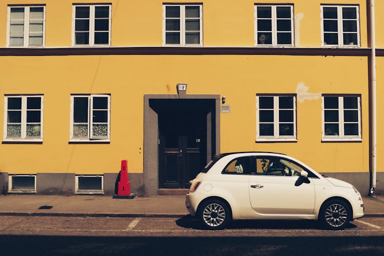 FIAT 500 Parked Near Building