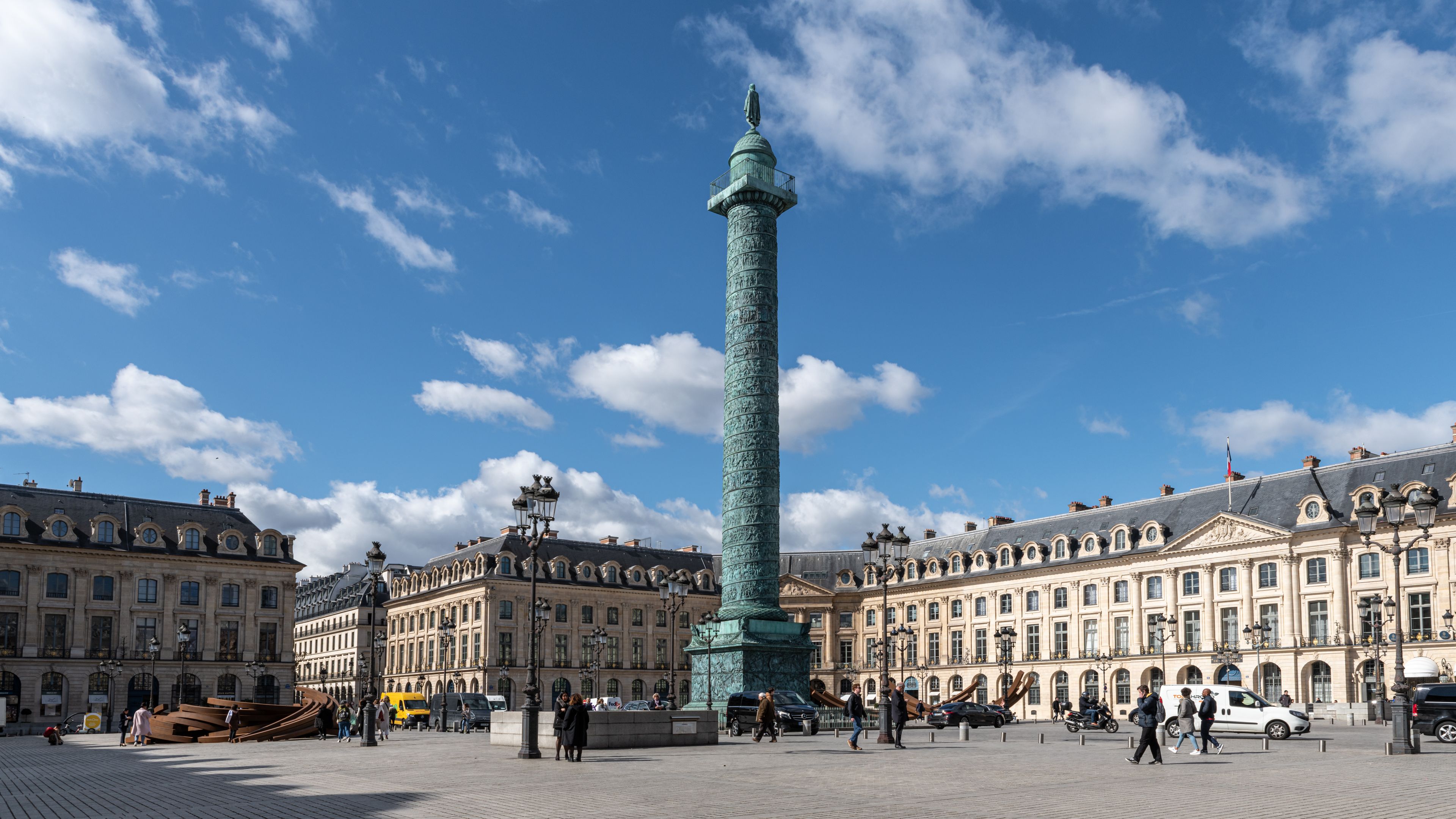 Luxury hotel facades on Place Vendôme in Paris's 1st arrondissement at dusk