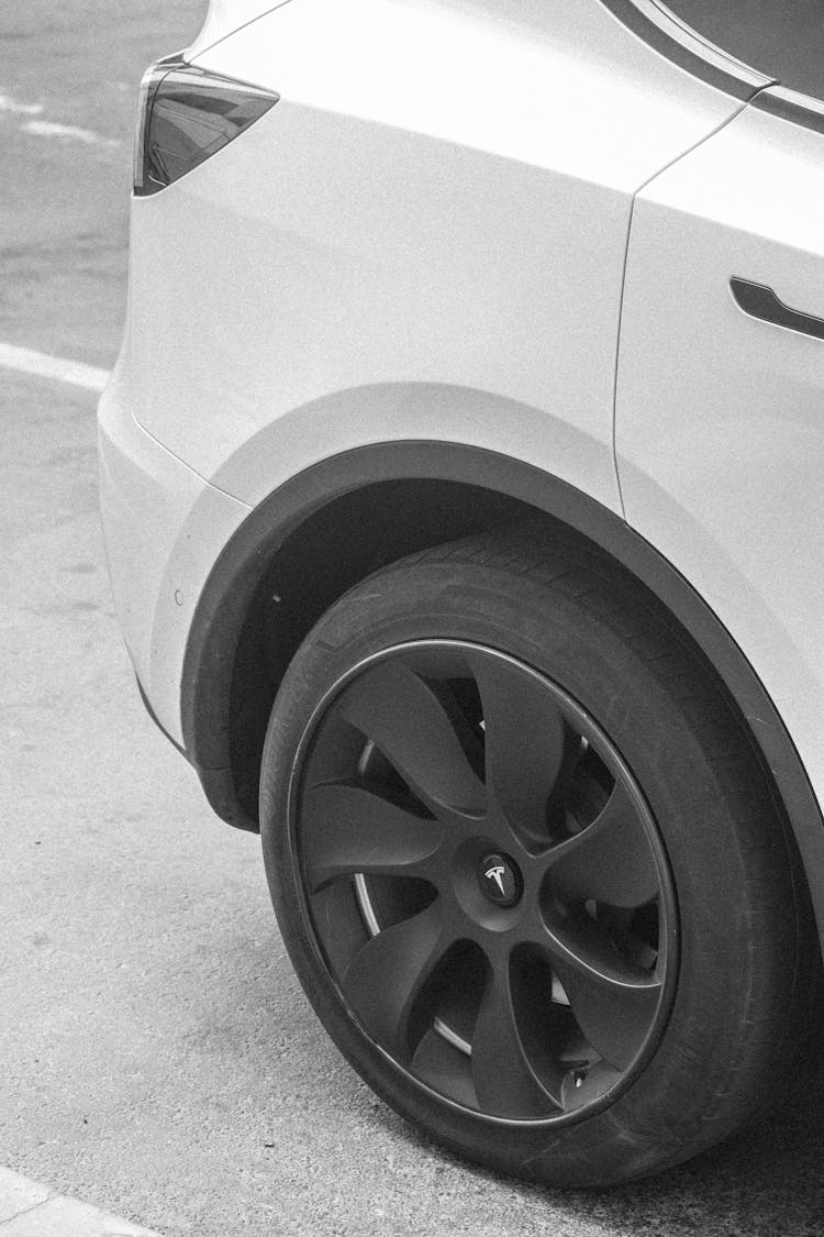 White Car On Black Allow Wheel