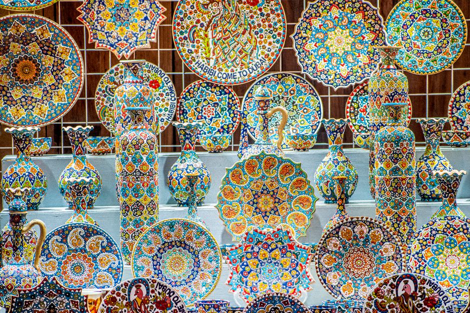 Bottles of traditional Arabic oud perfume in a perfumery in Dubai, UAE