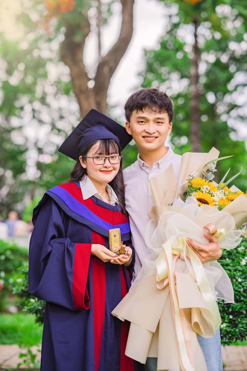 University Graduate Smiling with her Friend