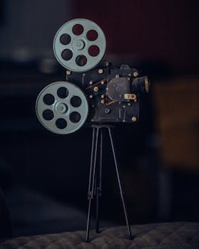 A classic vintage film camera on a tripod, capturing nostalgic cinematic equipment.