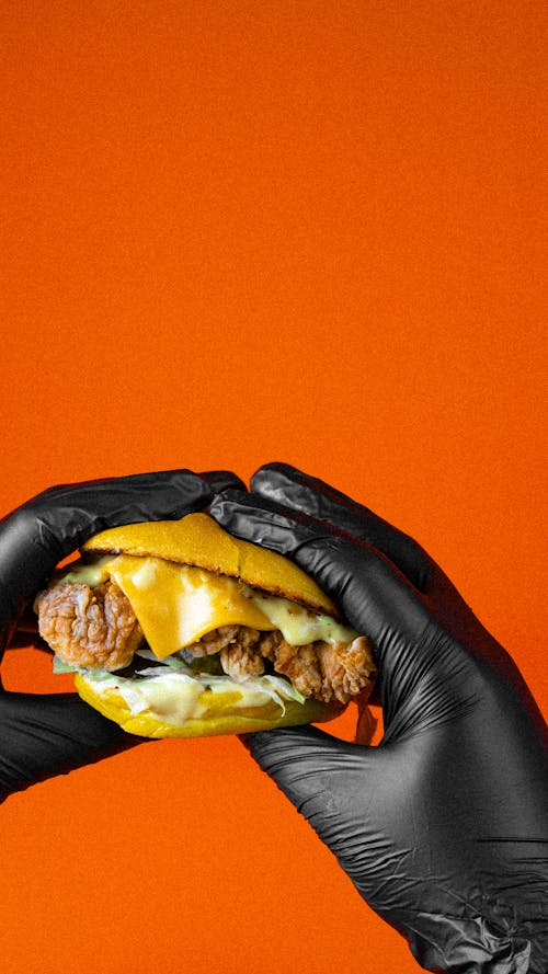 Darmowe zdjęcie z galerii z cheeseburger, fotografia kulinarna, orange_background