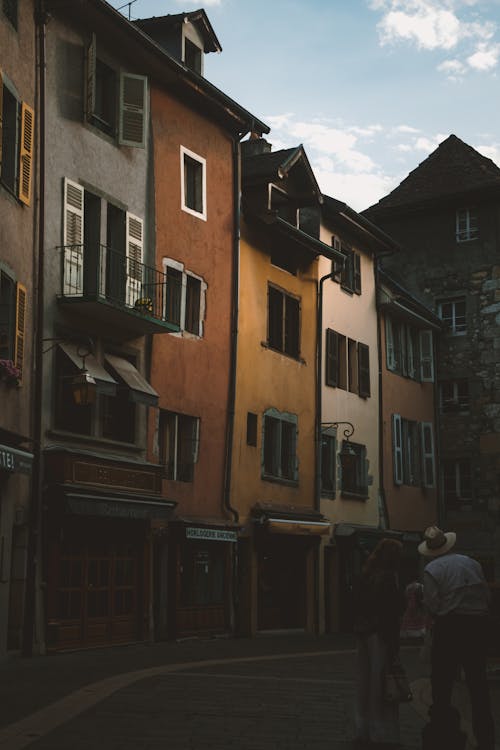 Colorful Narrow Townhouses by Cobblestone Street