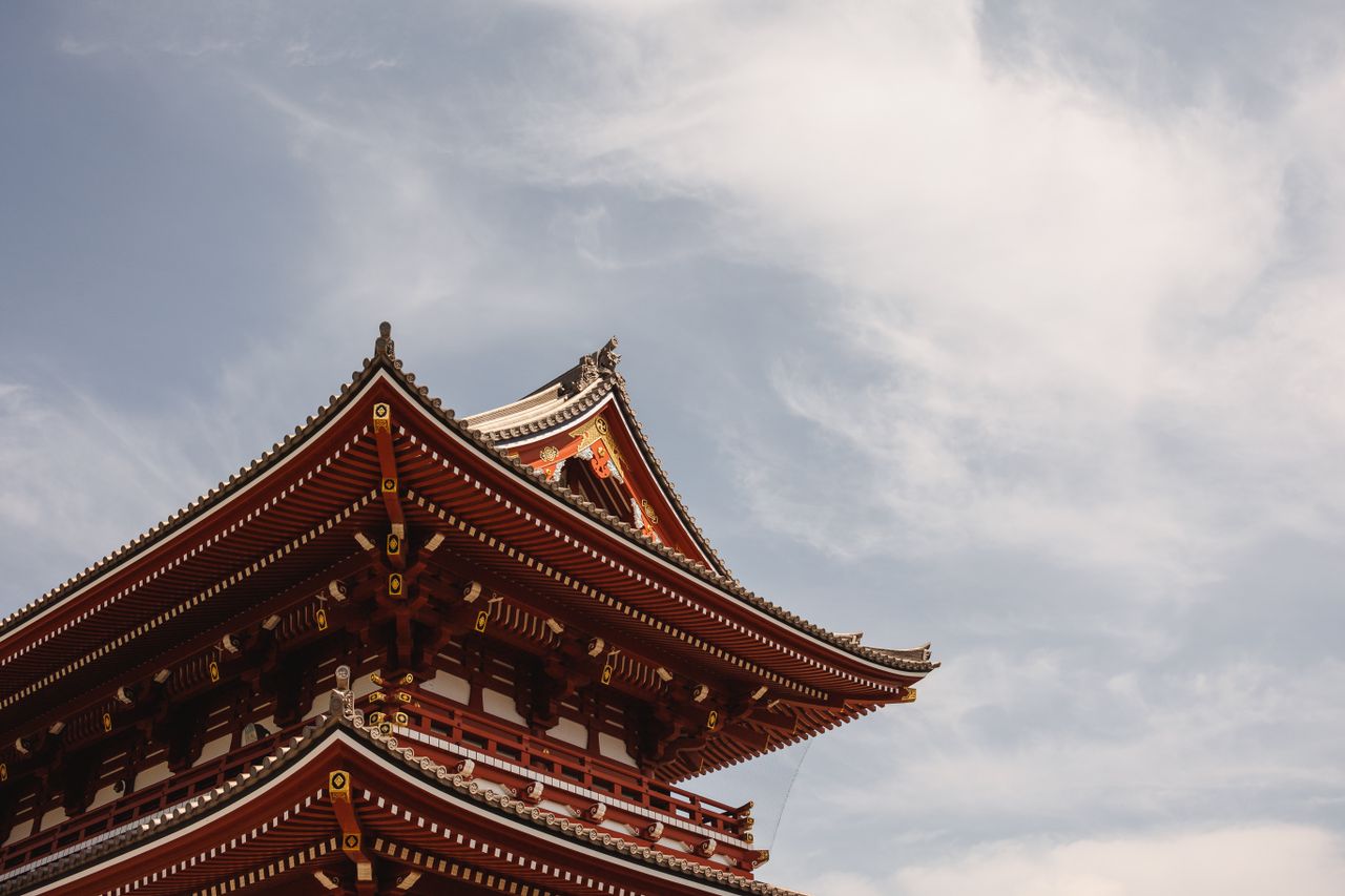 low angle view of senso ji temple roof in tokyo japan against the clou