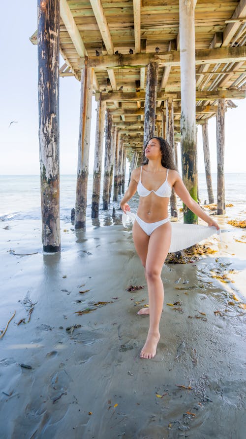 Model in Bikini under Pier
