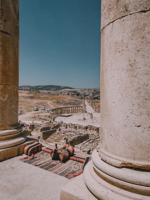 Free Explore ancient Roman ruins in Jerash, Jordan with sunlit columns and expansive views. Stock Photo