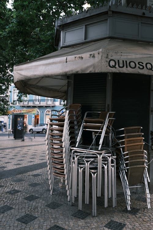 Chairs Stacked near Booth