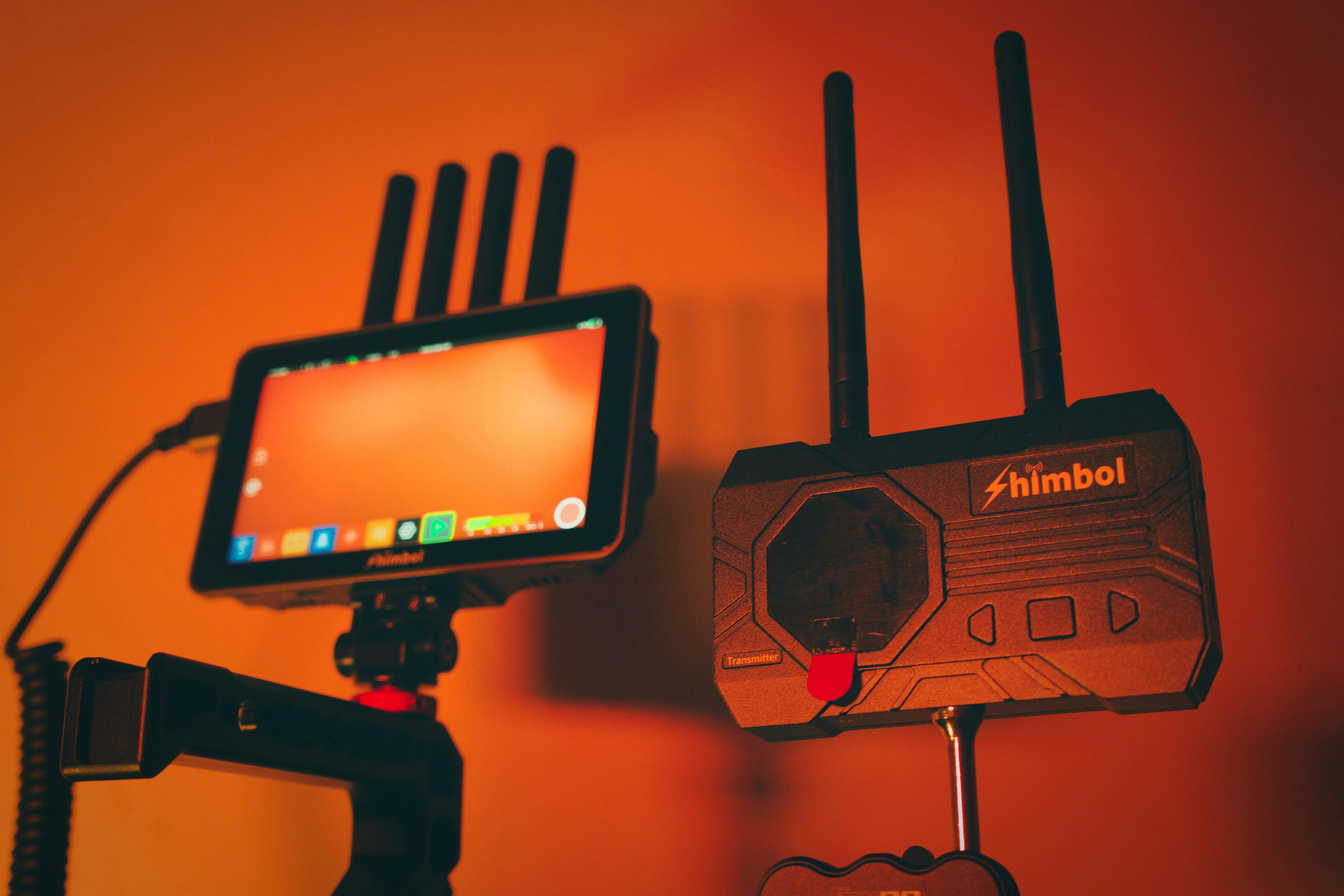 Black Canon Dslr Camera Behind Clear Highball Glass · Free Stock Photo