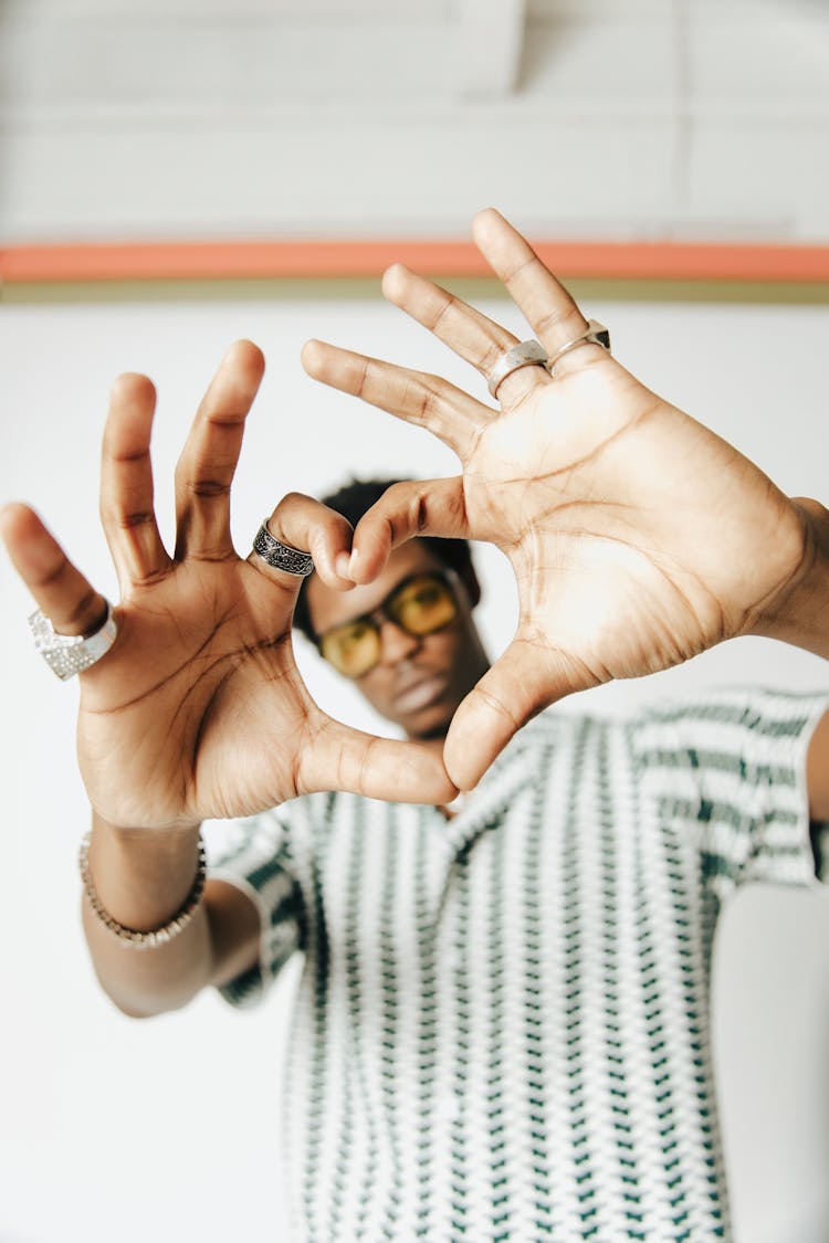 Man Making Heart Shape