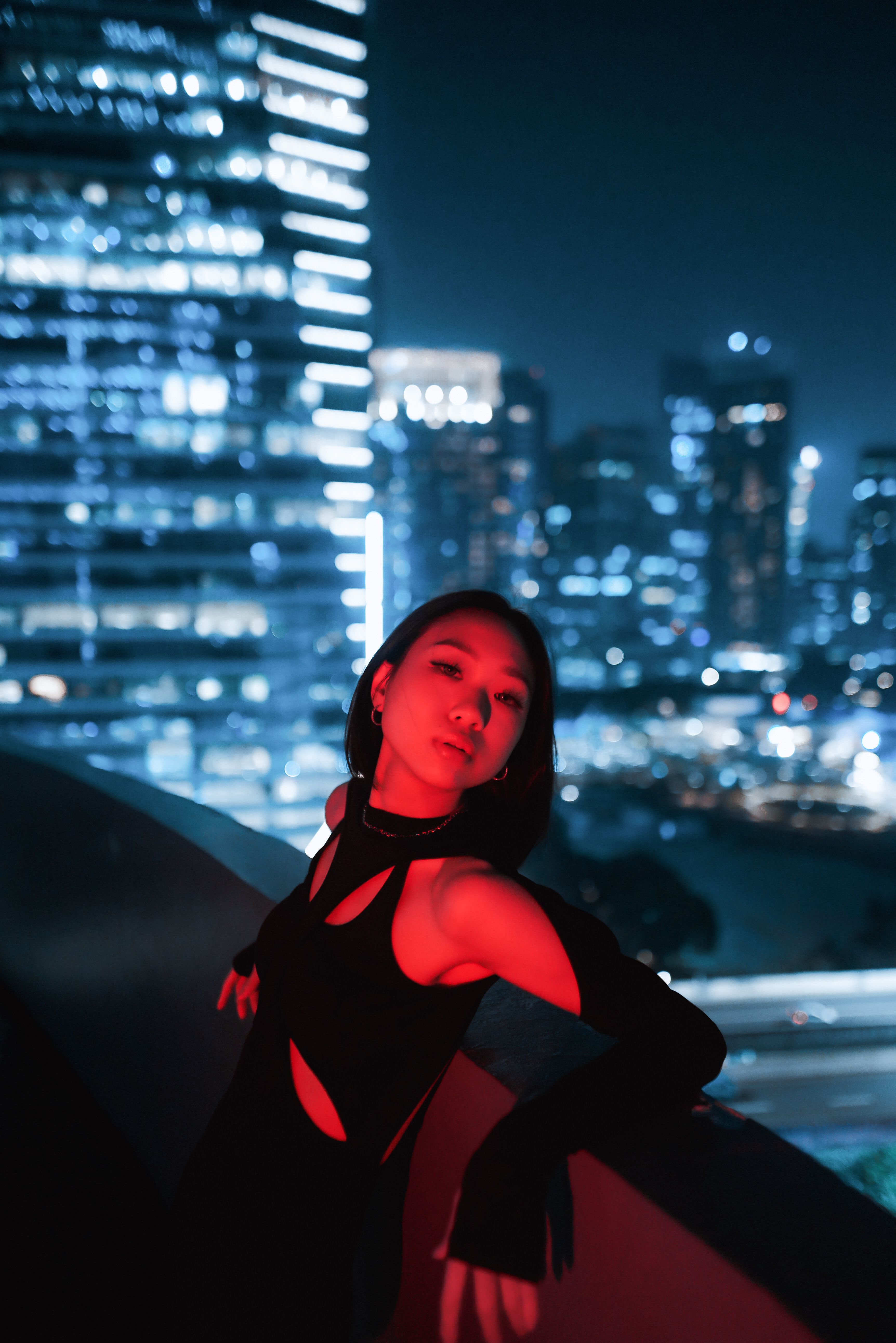 Young Beautiful Woman Posing in Night City · Free Stock Photo