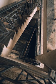 Top view of a dramatic spiral staircase in a historic Rosarian building, Argentina.