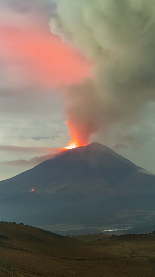 Lava and Smoke Coming Out of Erupting Volcano