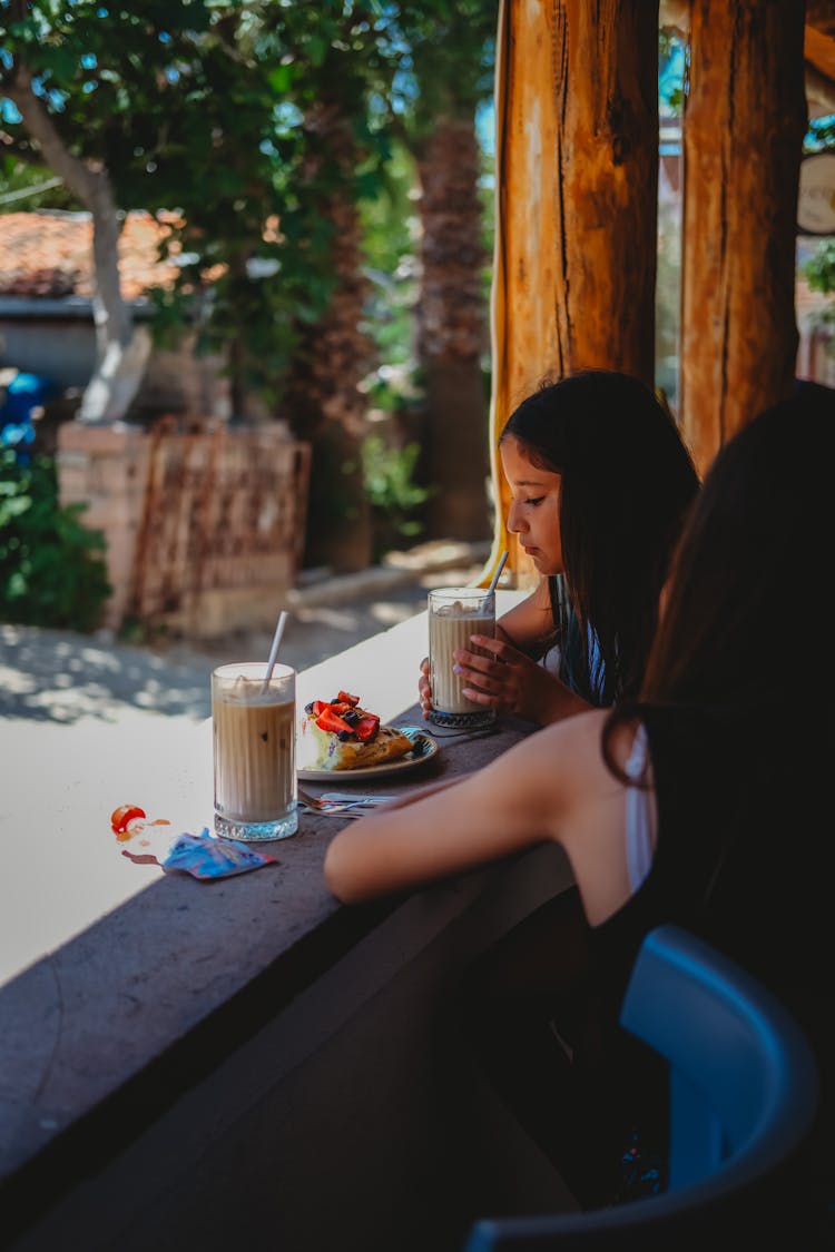 Friends In A Restaurant Terrace