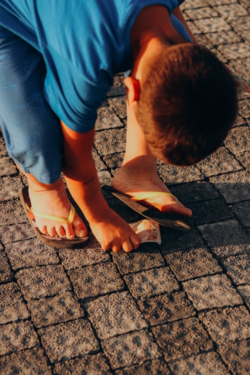 Boy on a Pavement in Sunlight 