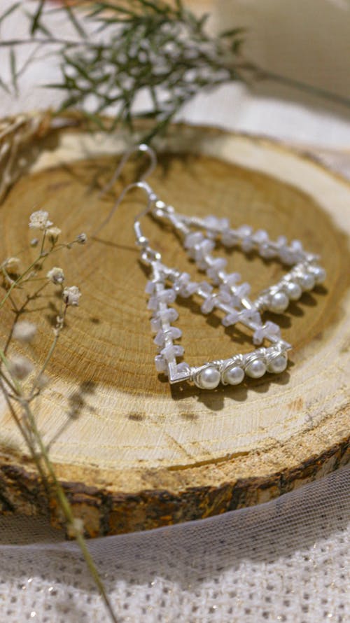 Close-up of Dangle Earrings in the Shape of a Triangle 