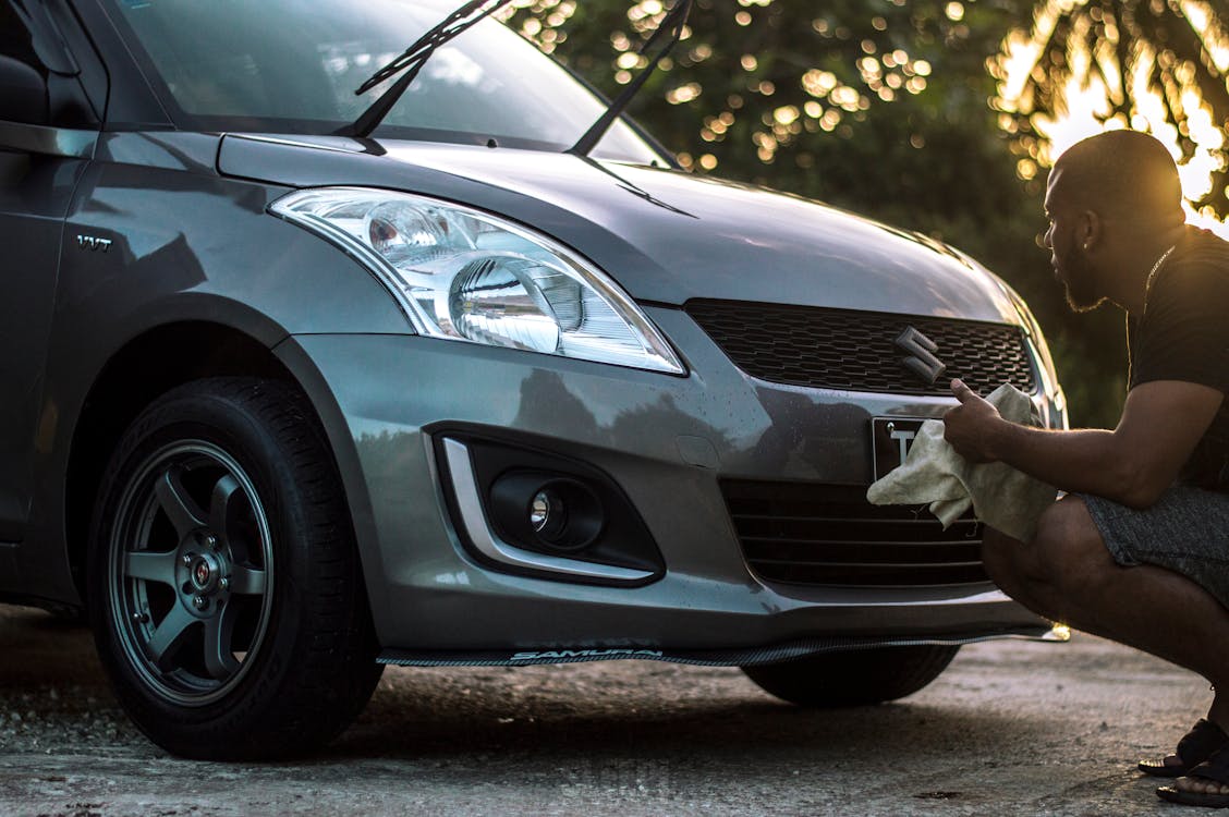 Free Photo of Man Cleaning His Car Stock Photo