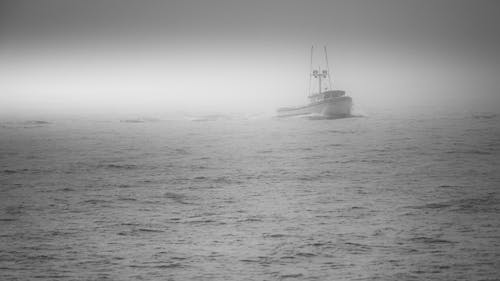 Ship Sailing under Fog