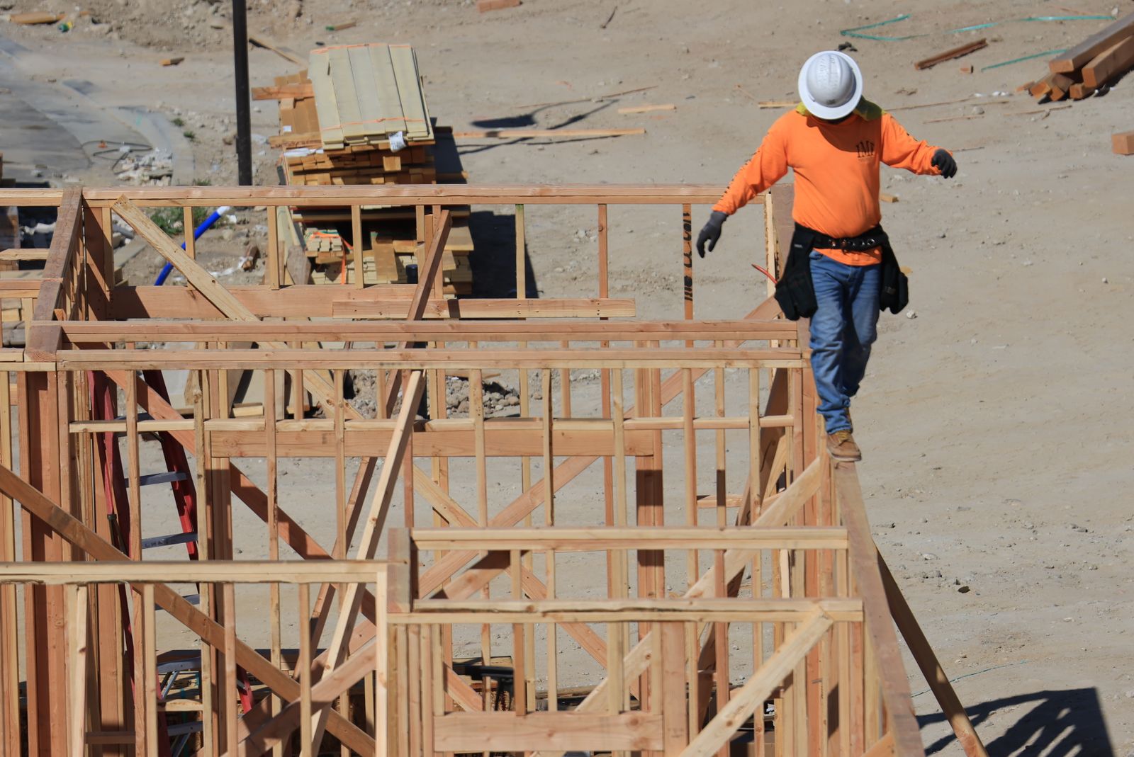 Construction worker on framing at new home build site — Tap to Call Button for Roofer Website Cutler Bay Setup