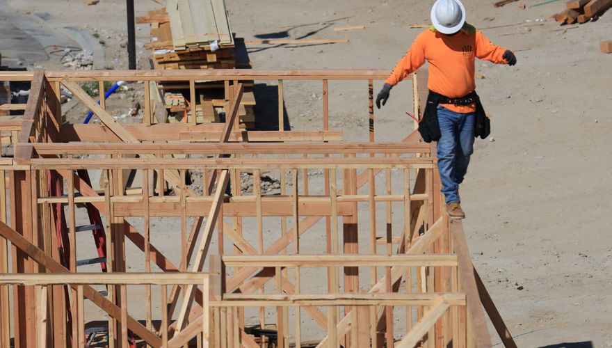 Construction workers on building project