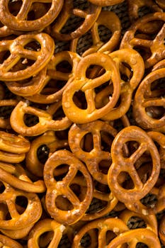 Delicious salted pretzels in a close-up shot, perfect for snack enthusiasts.