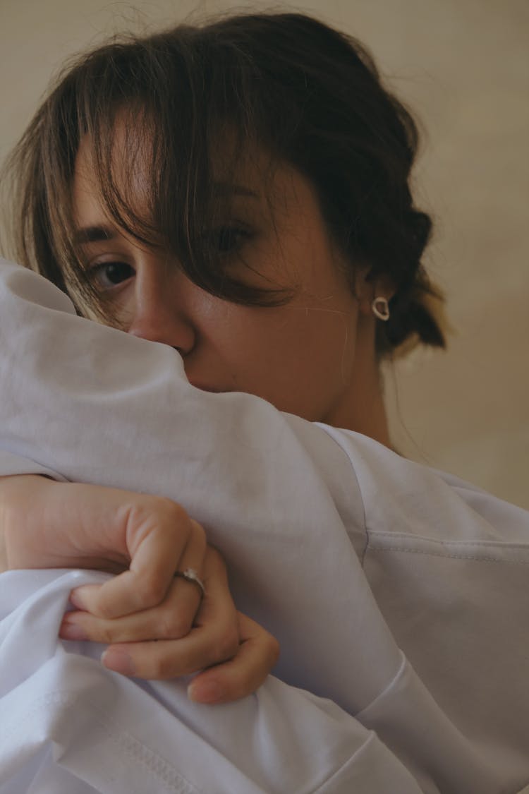 Woman Holding Pillow