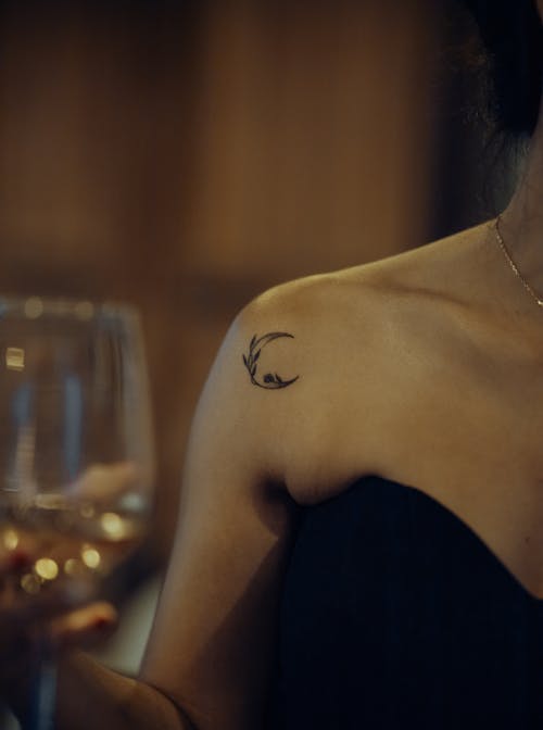 Tattoo on Woman Arm