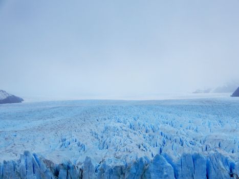 A breathtaking aerial view of the Perito Moreno Glacier in Santa Cruz, Argentina, captured in winter.