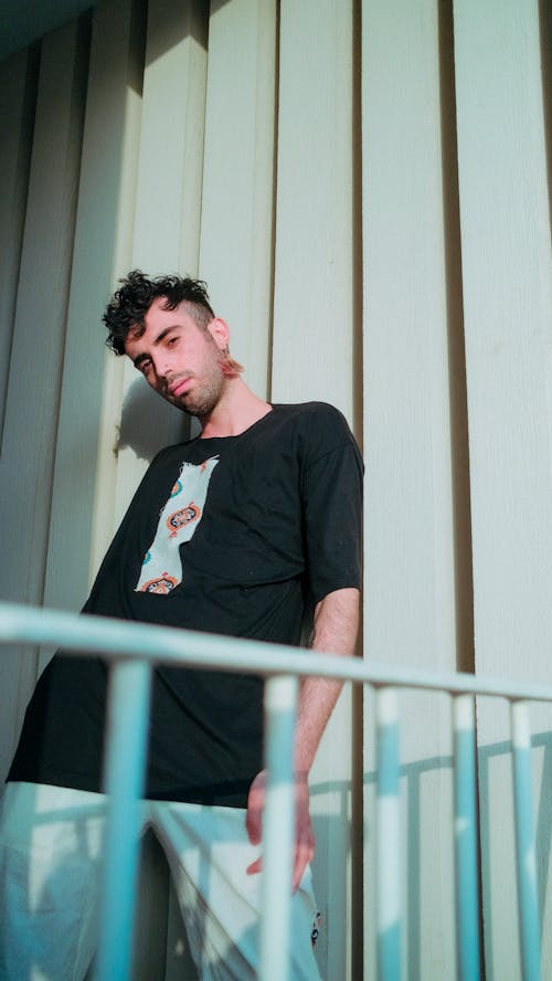 Man Posing in Black T-shirt