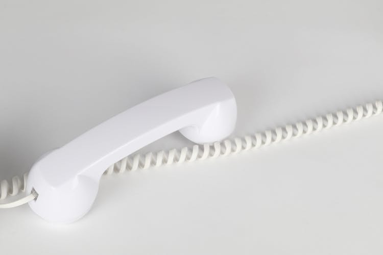 White Telephone On The Table