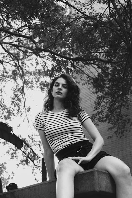 Woman in a Striped T-Shirt and Shorts 
