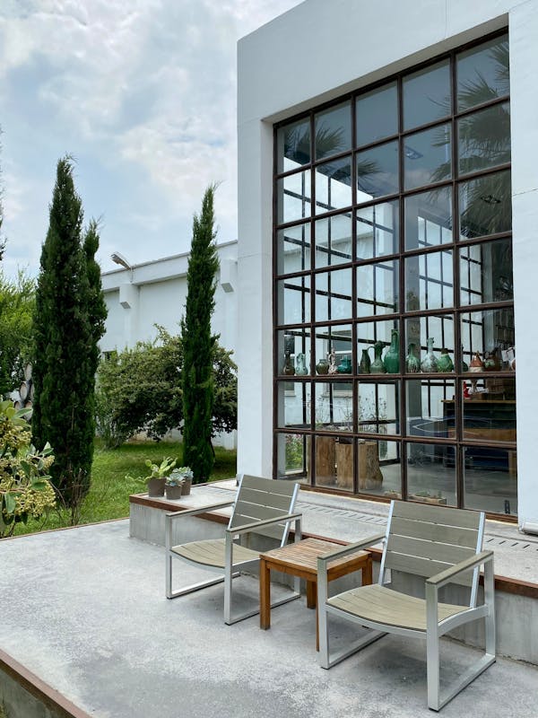 Adirondack chairs by a fire pit