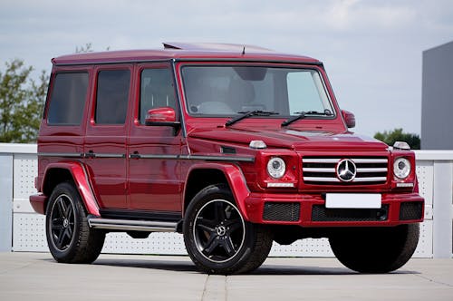 A Red Mercedes-Benz G350d on a Parking Lot 