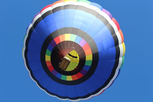 Low Angle Shot of a Hot Air Balloon against Blue Sky 