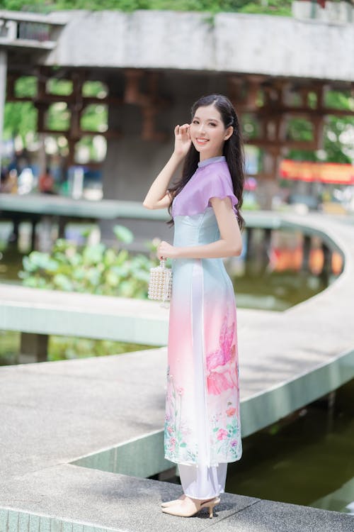 Young Elegant Woman Posing in a Park