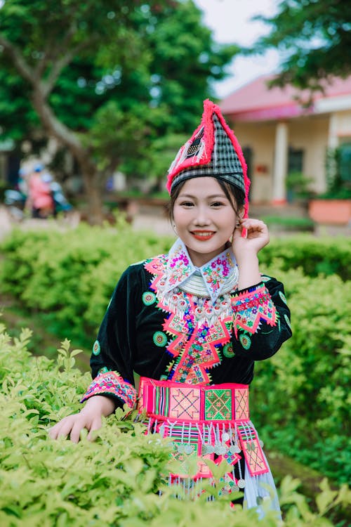 Smiling Woman in Traditional Clothing