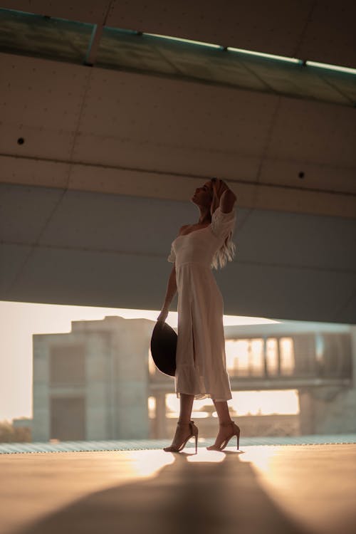 Woman in White Dress and High Heels