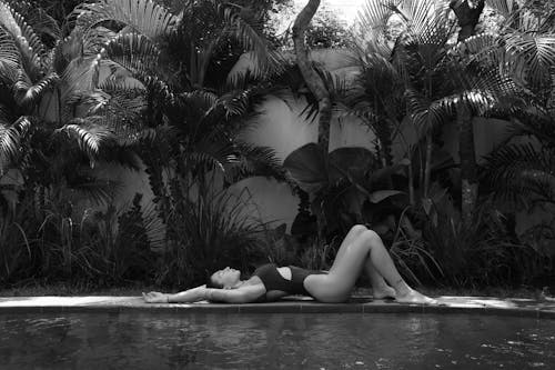 Young Woman Relaxing on a Poolside