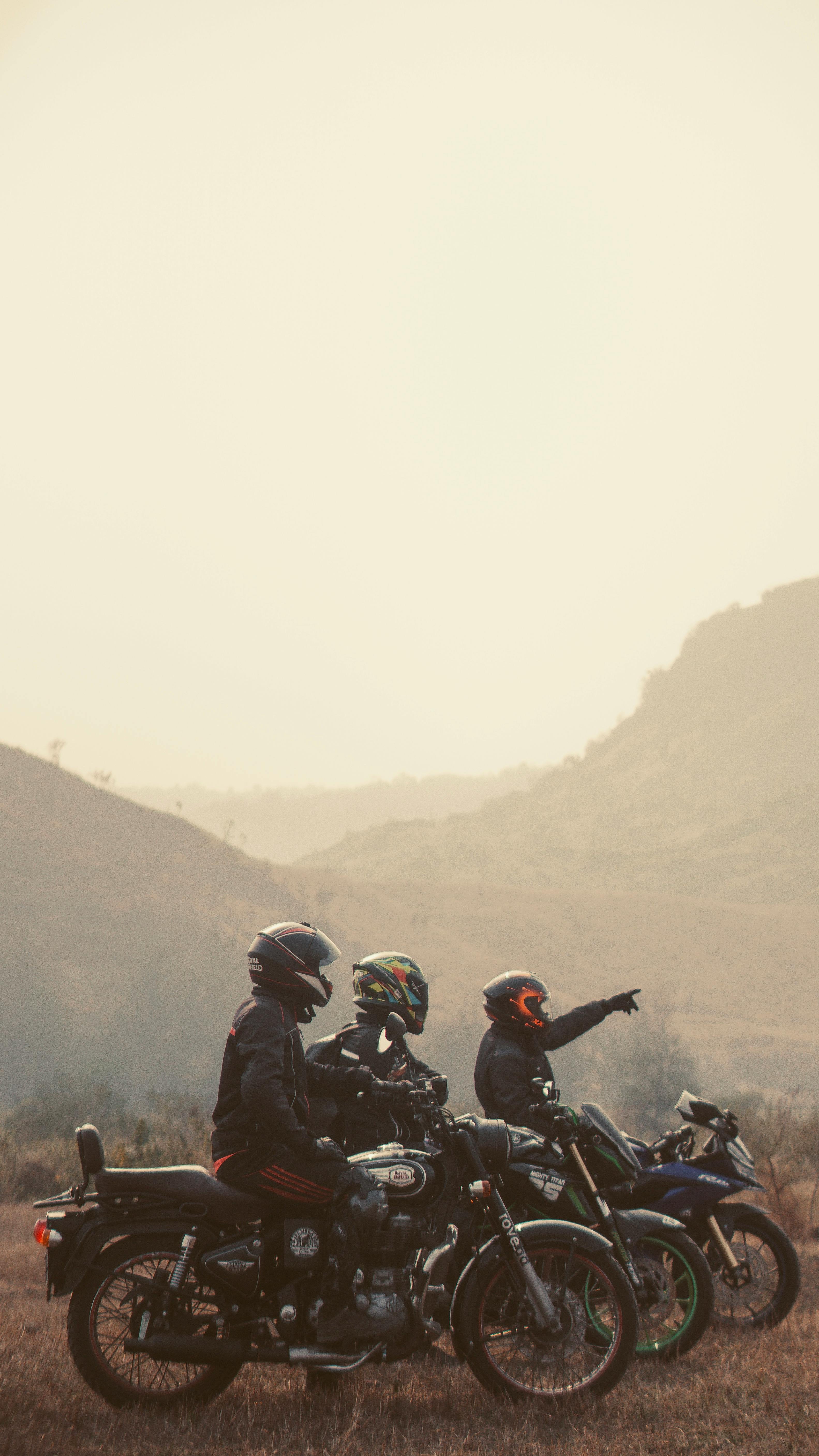 people on motorbikes in countryside