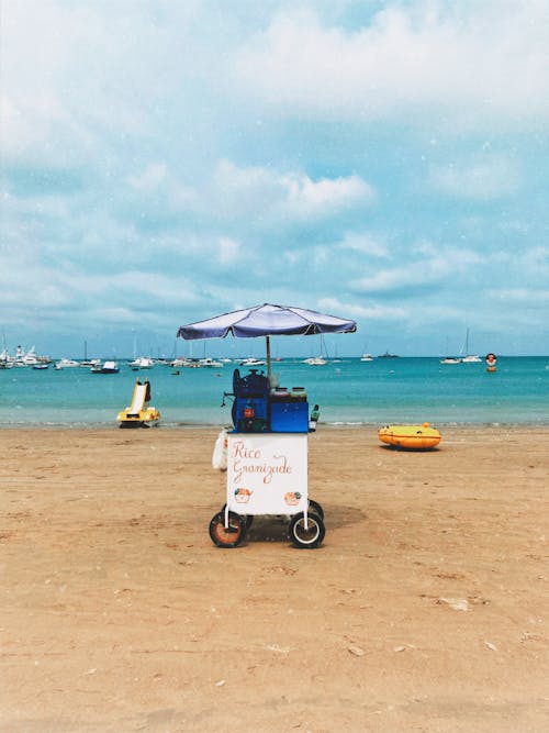 A Cart with Cold Drinks on the Beach