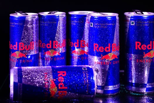 Wet Red Bull Cans 