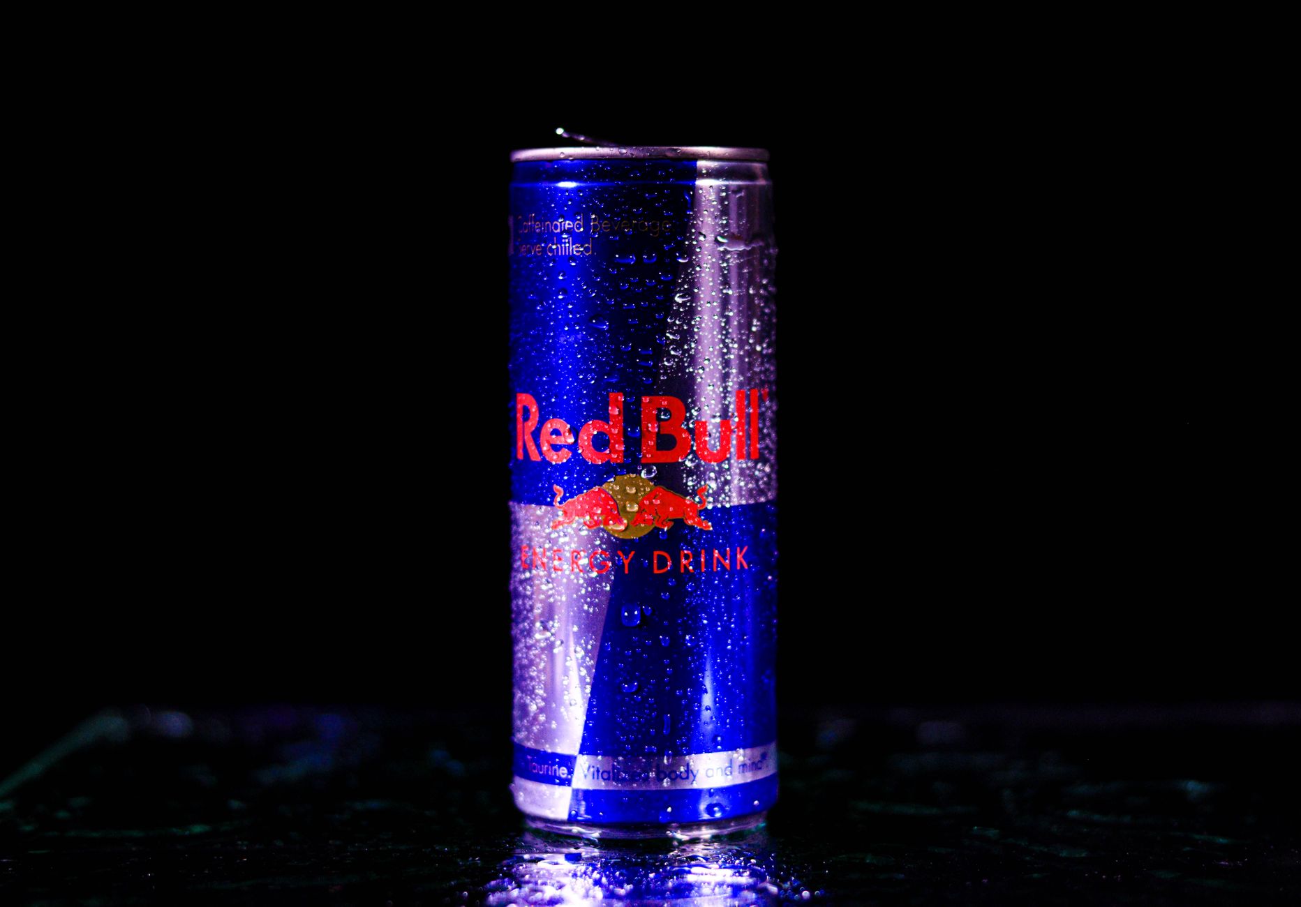Energy drink label close up showing ingredients and caffeine content