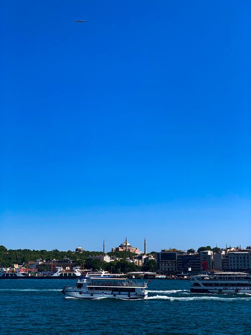 Free Beautiful daytime view of the Bosphorus, showcasing Istanbul's iconic skyline and vibrant sea traffic. Stock Photo