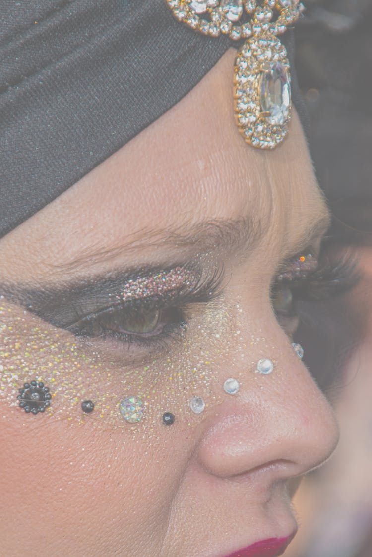 Jewel And Beads On Woman Face