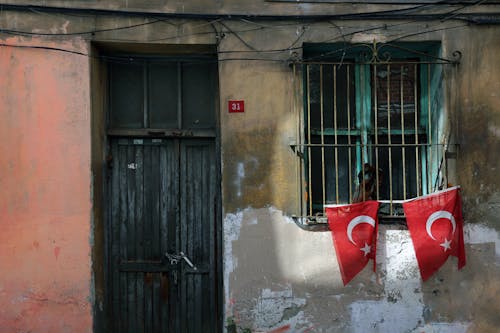 Turkish Flags on Barred Window