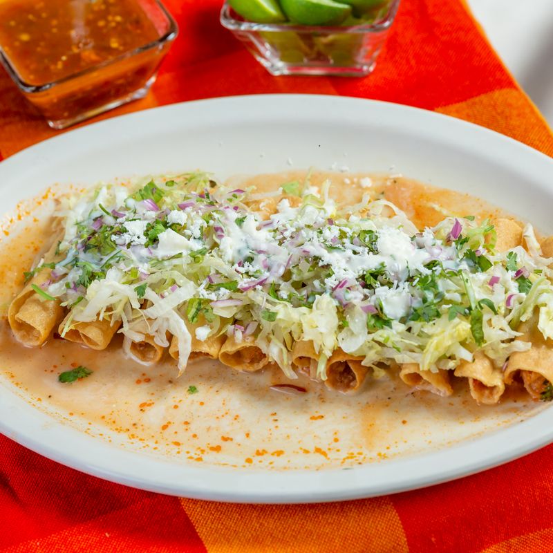 Baked Chicken Taquitos with Salsa Verde and Monterey Jack