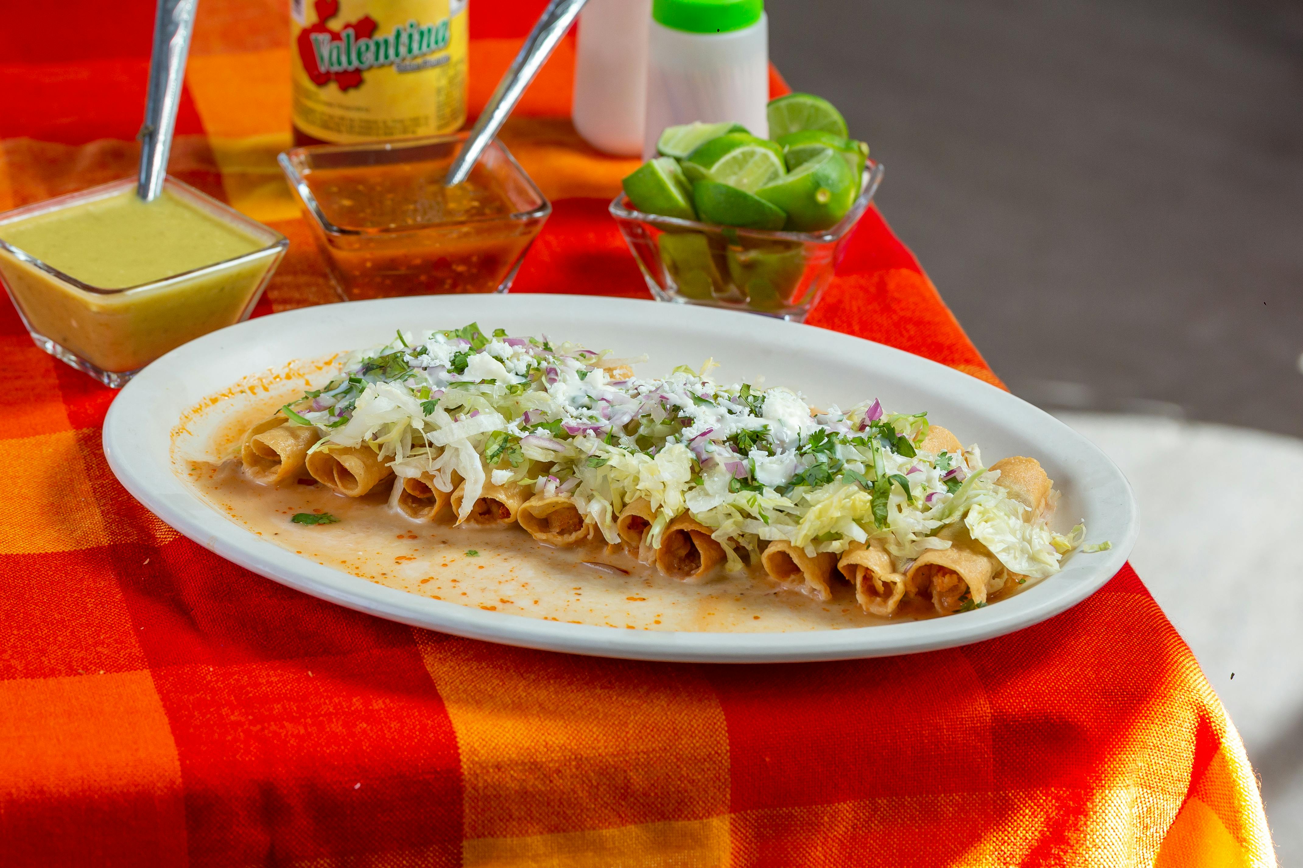 Plate of Mexican Taquitos with Dipping Sauces · Free Stock Photo